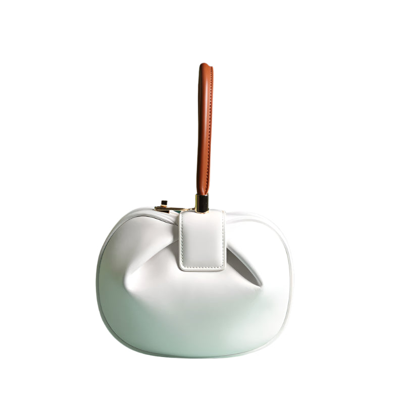 White handbag with a brown handle real leather 