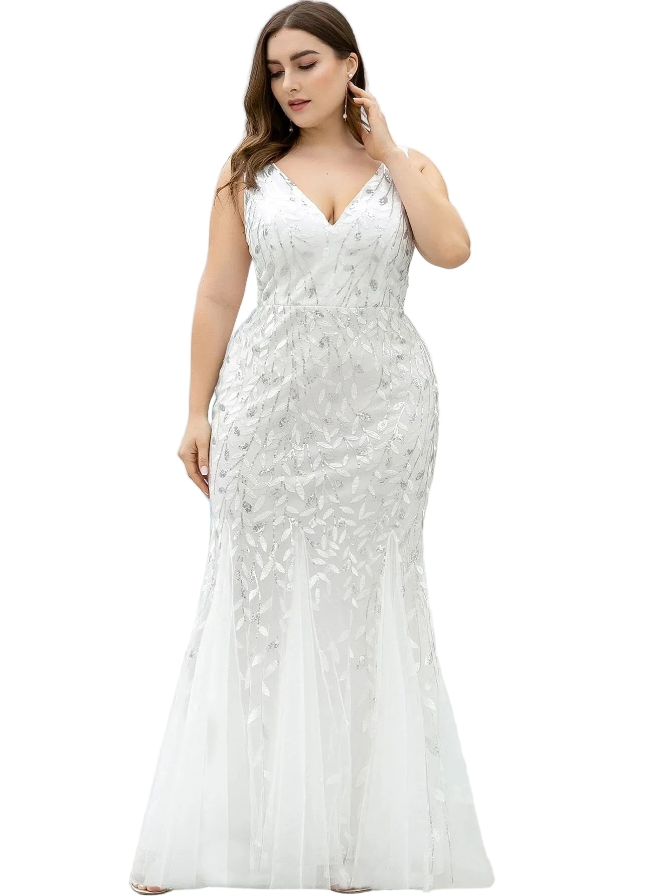 Woman wearing a white sequins dress  for  evening party