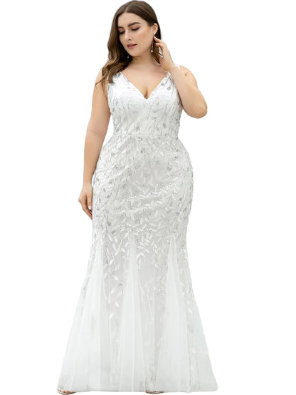 Woman wearing a white sequins dress  for  evening party