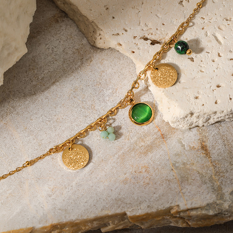 Gold bracelet  with green jade beads 