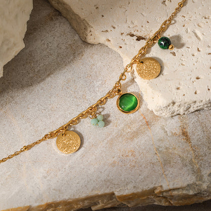 Gold bracelet  with green jade beads 
