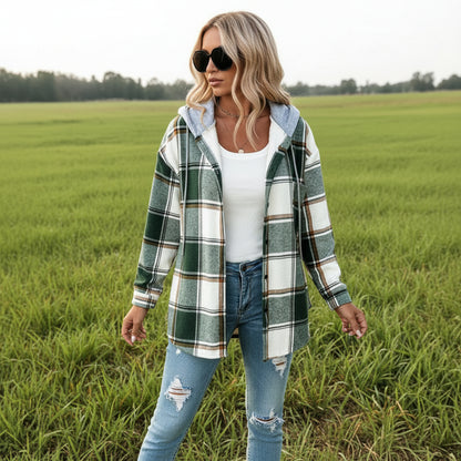 Hooded plaid coat in green – close-up of button-front closure and hood construction detail
