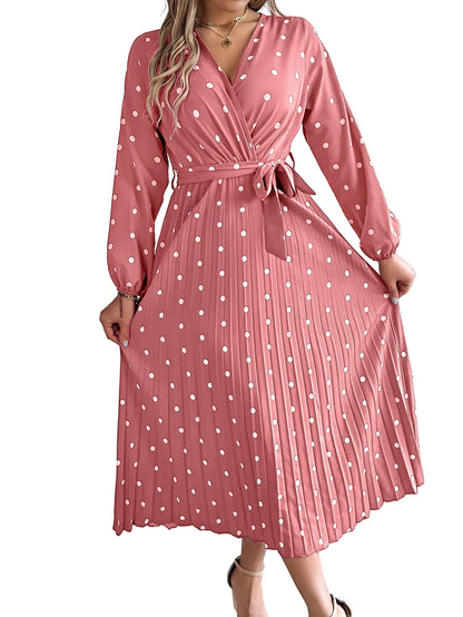 Polka dot contrast pleated maxi dress in light pink  – front view showing cross V-neck and full length skirt
