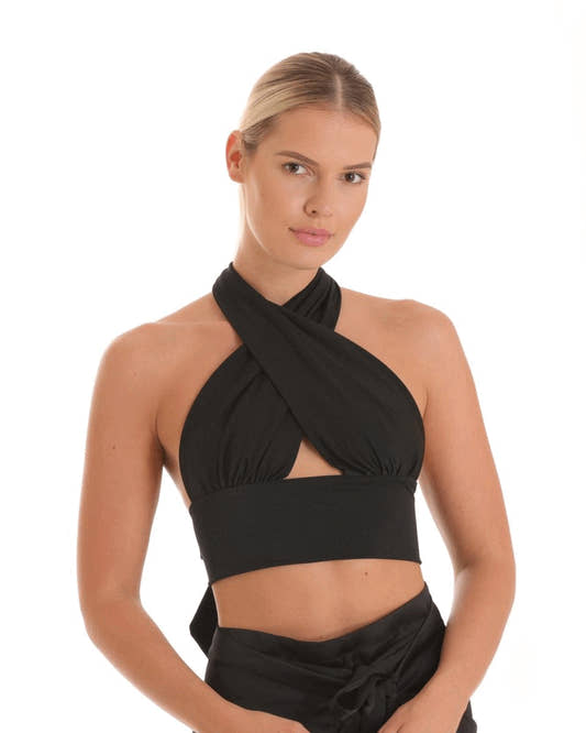 Blond girl wearing a black 8-Way Top  – 