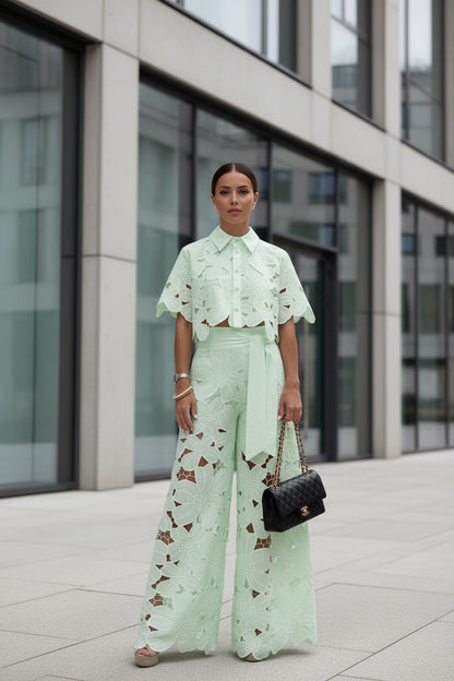 woman  wearing a light green lace outfit set