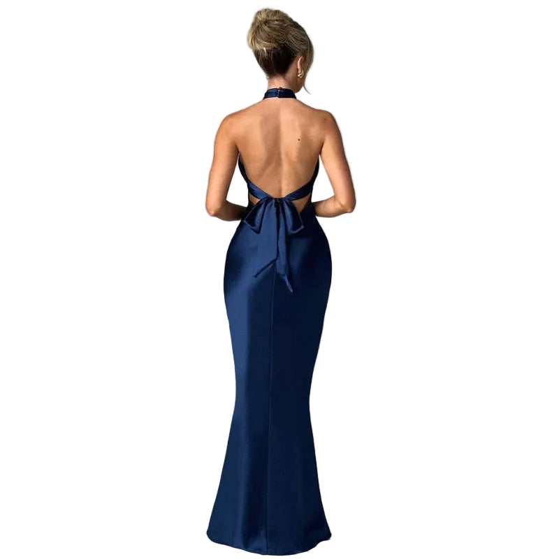 Elegant backless satin maxi dress showing halter neckline and fitted silhouette open back 

