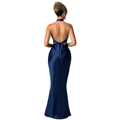 Elegant backless satin maxi dress showing halter neckline and fitted silhouette open back 

