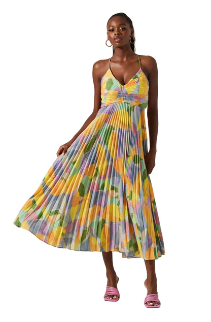 Floral sling maxi dress – side view showing pleated skirt and sling bodice construction
