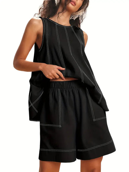 Two-piece lounge set in black – close-up of sleeveless tank top and shorts with pockets detail
