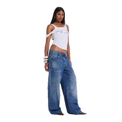 Close-up of cute baggy jeans featuring intricate beaded detailing on denim

