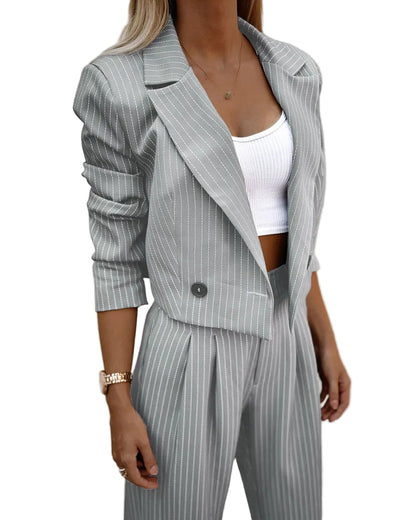 Gray pinstripe cropped lapel blazer and wide-leg trouser set – front view showing high waist trouser and cropped hem
