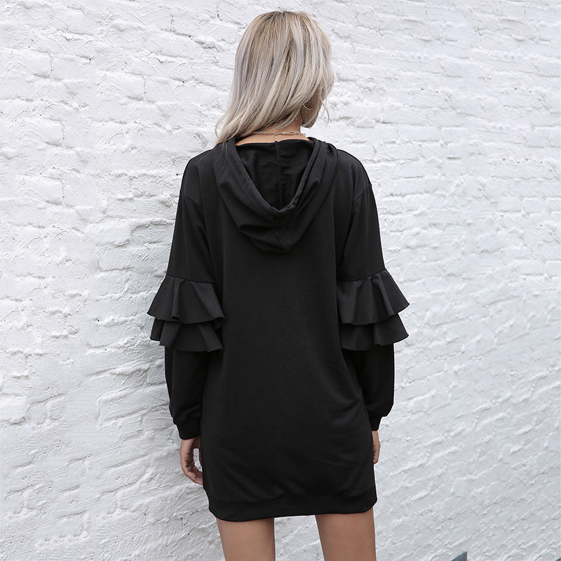 

Black hoodie skirt dress showing cozy comfort and style