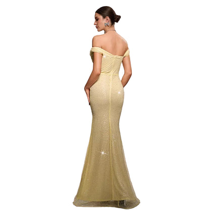 Back view of yellow sequined mermaid evening gown – elegant formal dress with flared skirt
