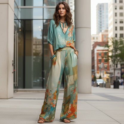 Women's co-ord set featuring graffiti print straight-leg pants and matching top

