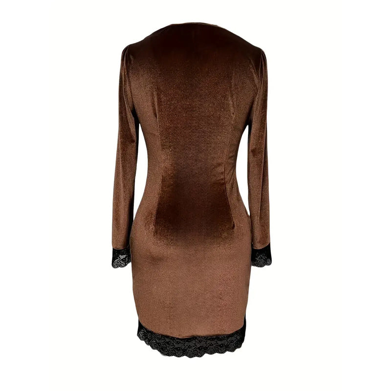 Back view of V-neck  velvet mini dress showing fitted construction