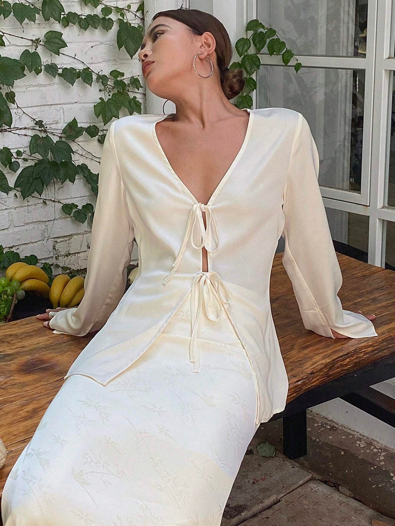 White women's shirt with cinched waist styling for office and casual wear