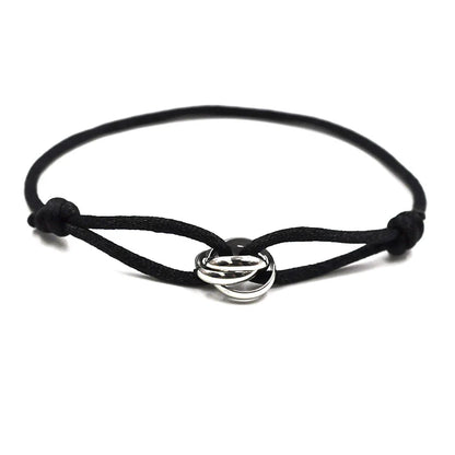 Black cord bracelet with a silver clasp 