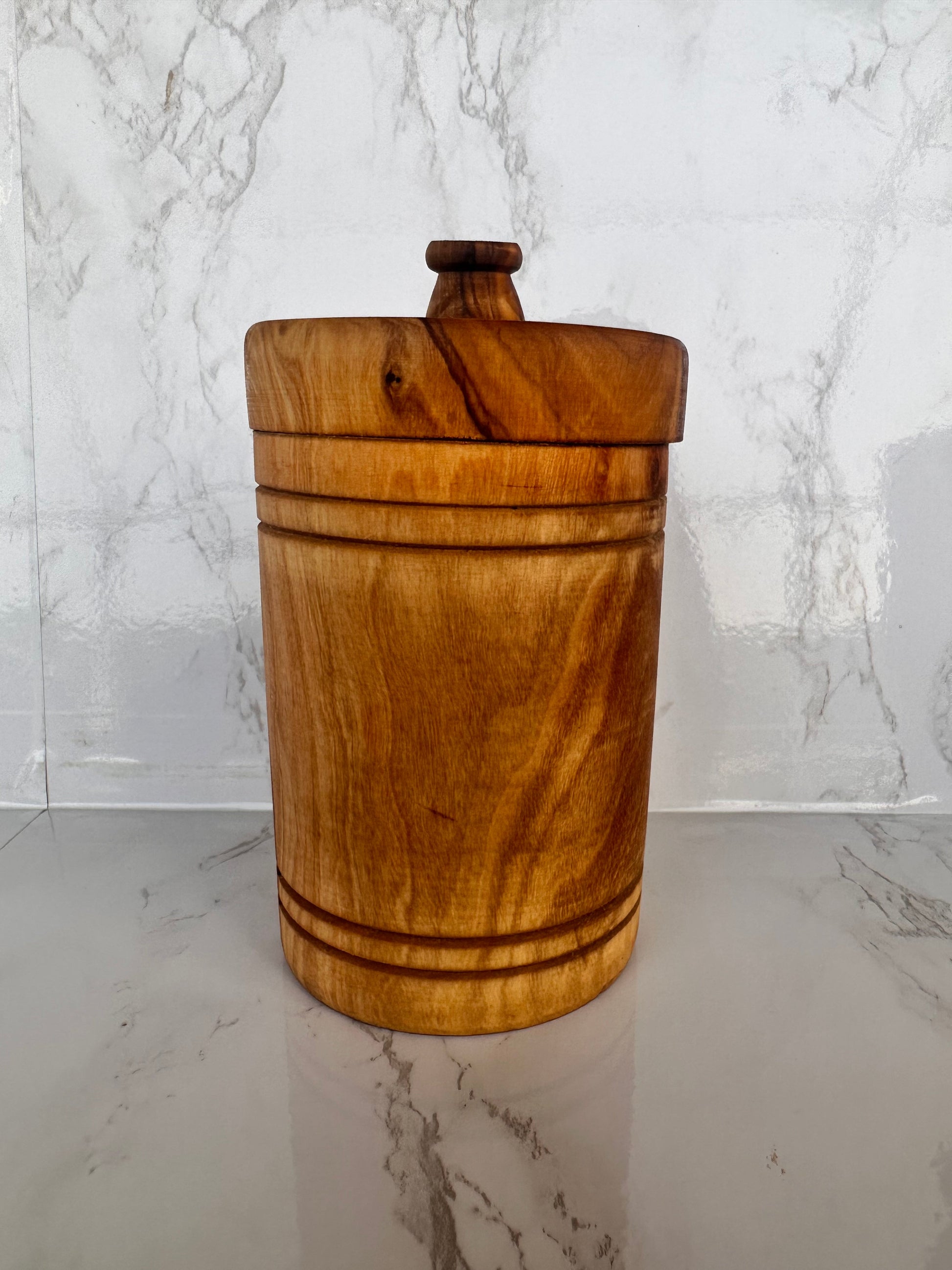 olive wood container with a lid for salt or spices 
