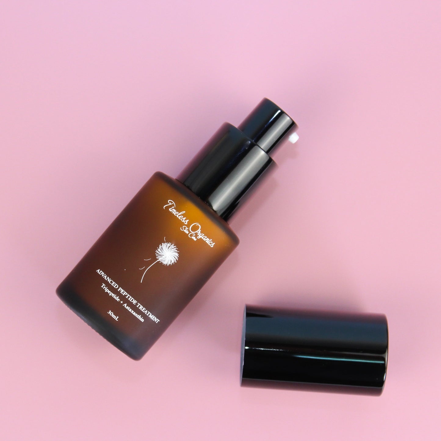 Skincare bottle with black cap of a nourishing peptide treatment for skincare 
