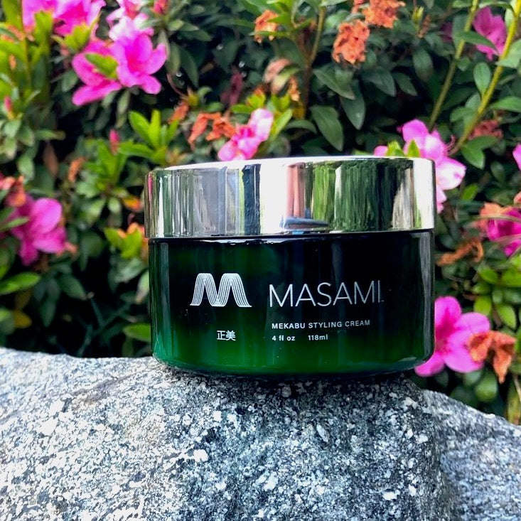Green jar of MASAMI styling cream 