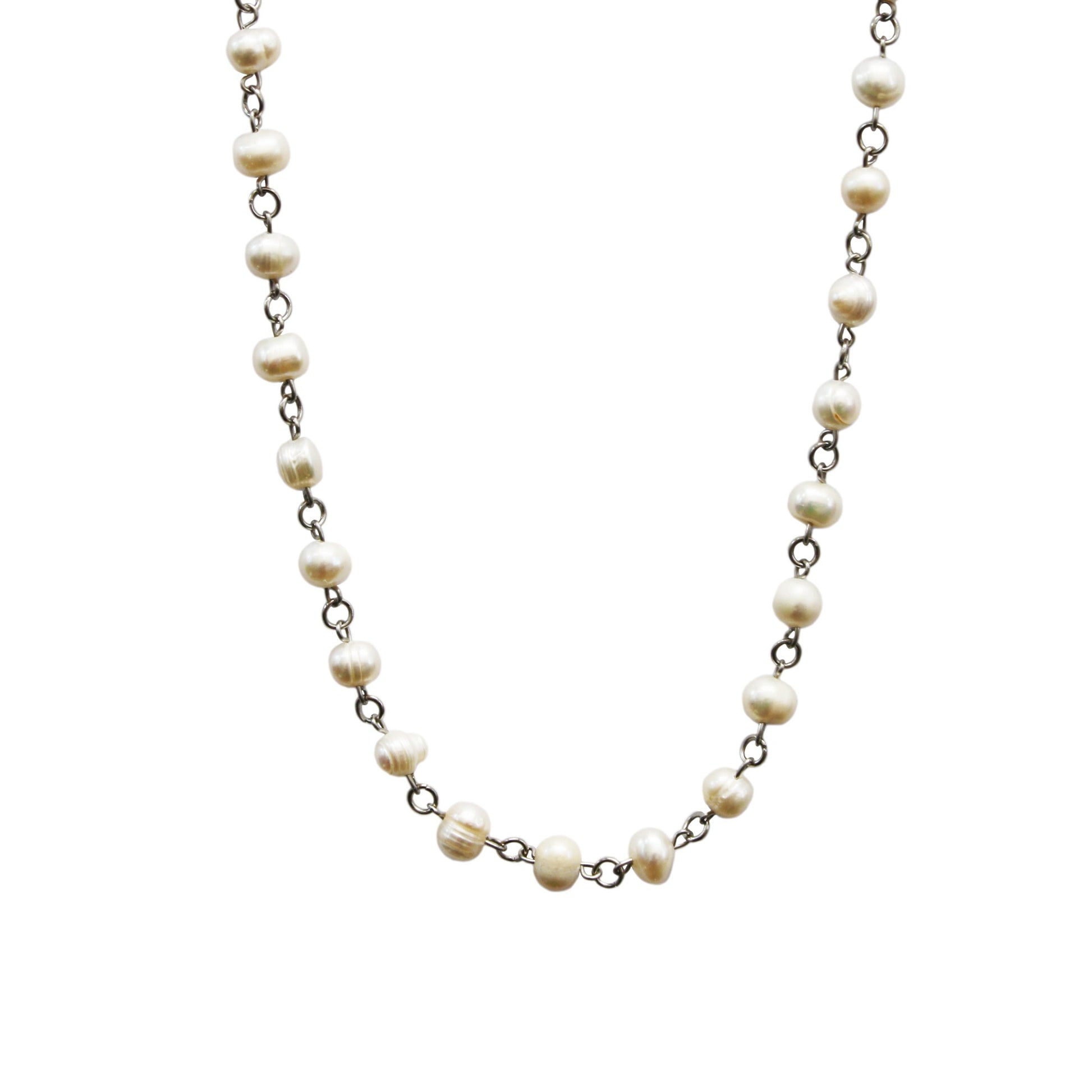 Pearl necklace on a white background