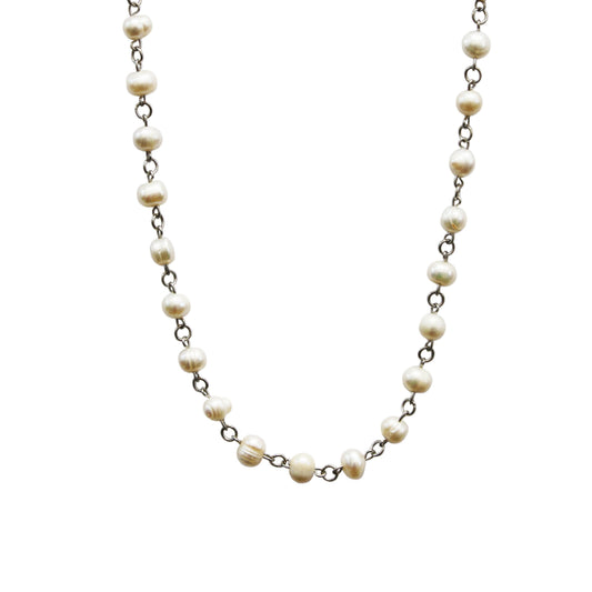 Pearl necklace on a white background