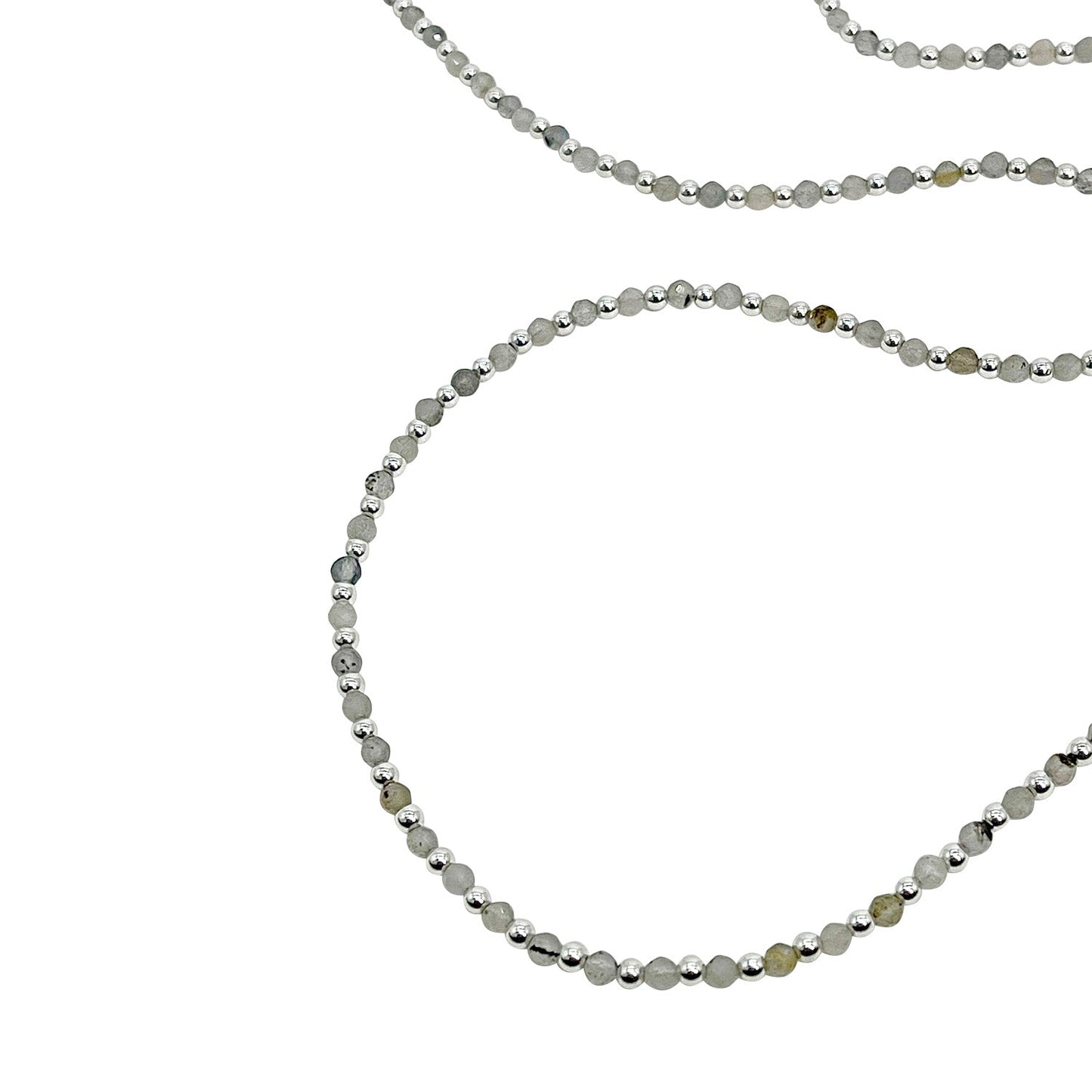 Necklace with small beads on a white background