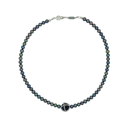 Necklace with black pearls and silver clasp on a white background