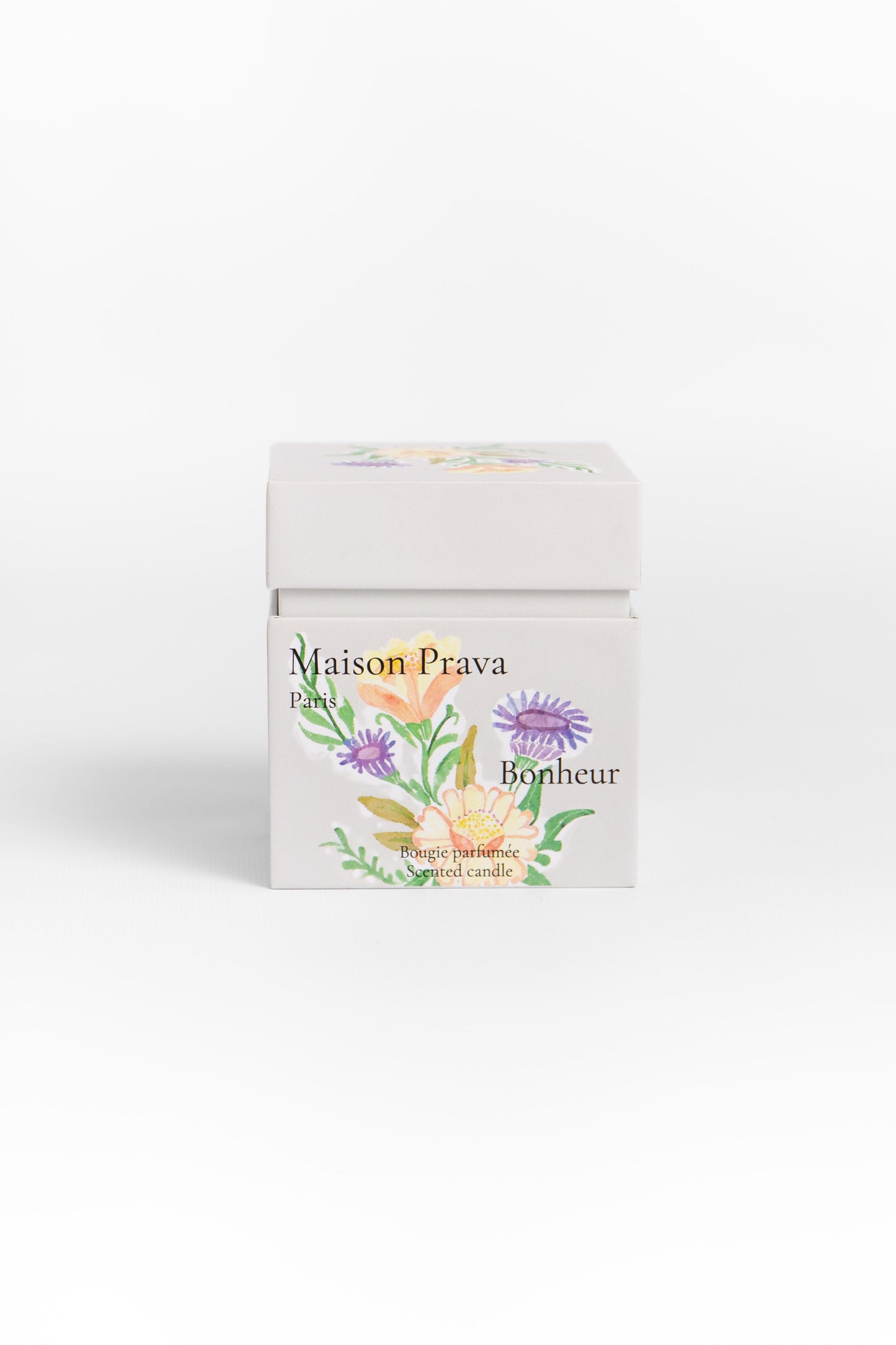 Maison Prava candle packaging with floral design 