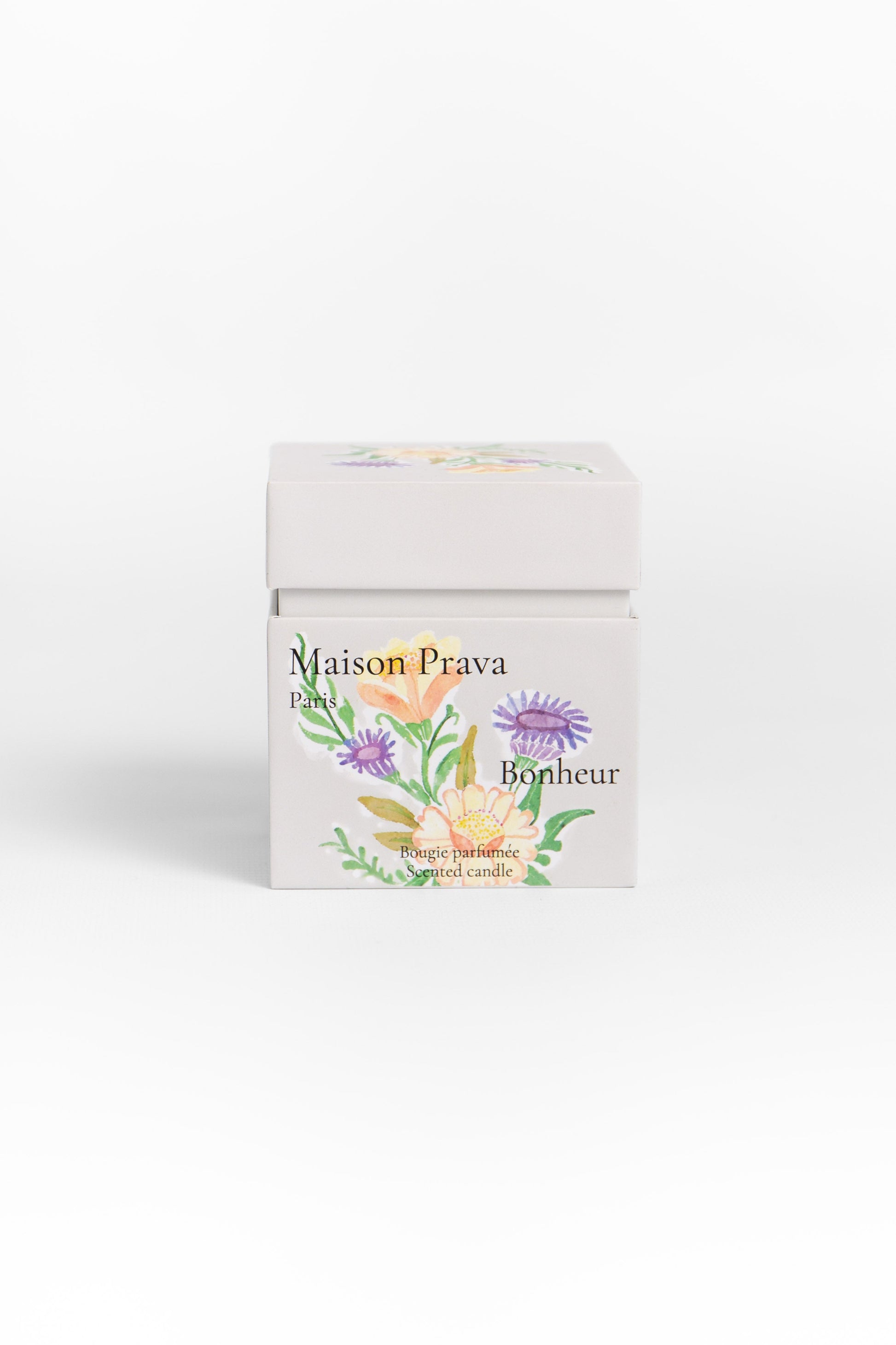 Maison Prava candle packaging with floral design 