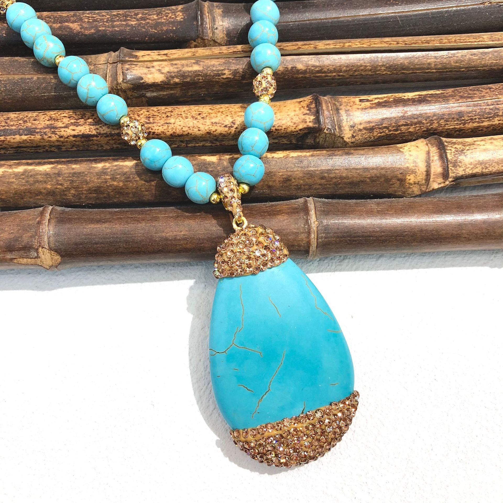 Elegant turquoise pendant on bead chain jewelry
