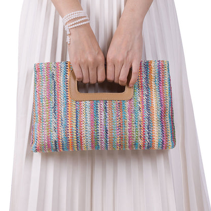 Multicolored striped clutch 