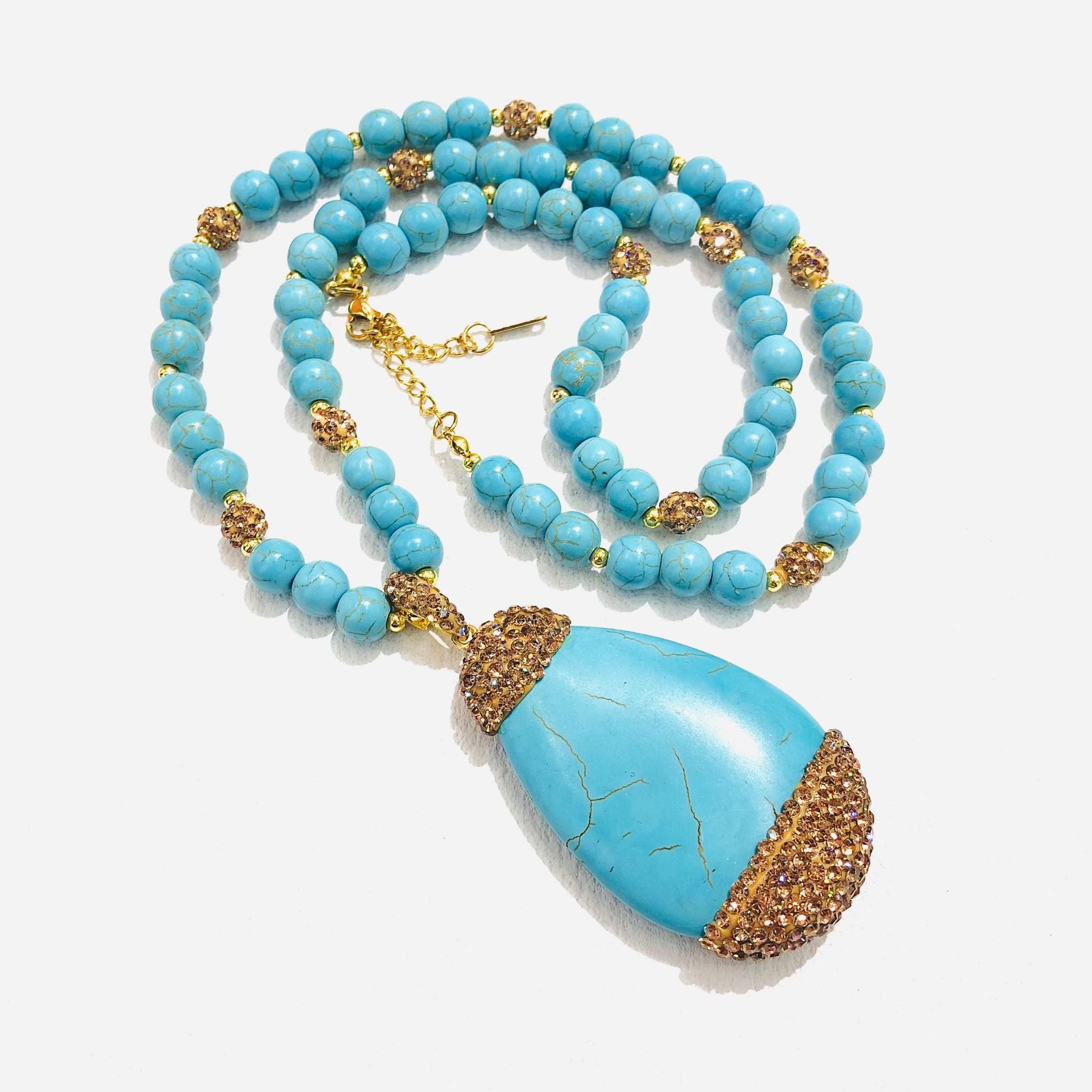 Turquoise beaded necklace with a large turquoise pendant