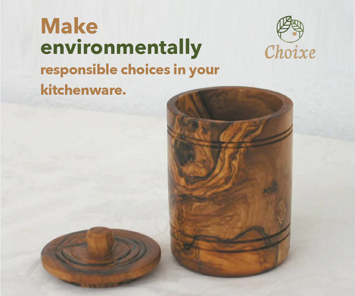 Wooden canister with lid on a white background, promoting environmentally responsible kitchenware choices.