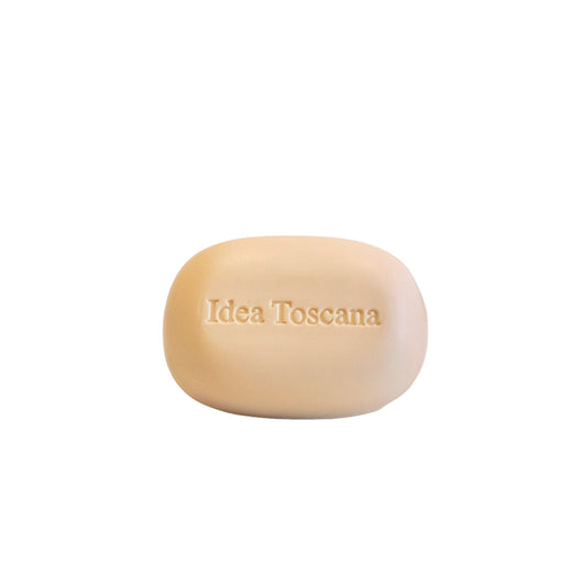 Beige bar of soap with 'Idea Toscana' branding made in Italy 