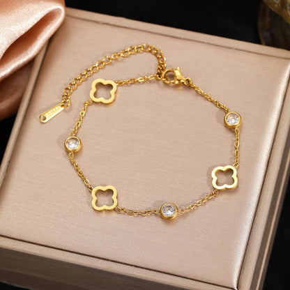Adjustable gold clover chain bracelet with bezel-set crystal stones – 
