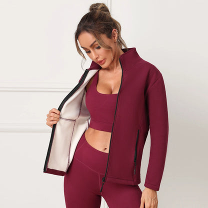 Woman wearing a burgundy athletic outfit with a jacket 