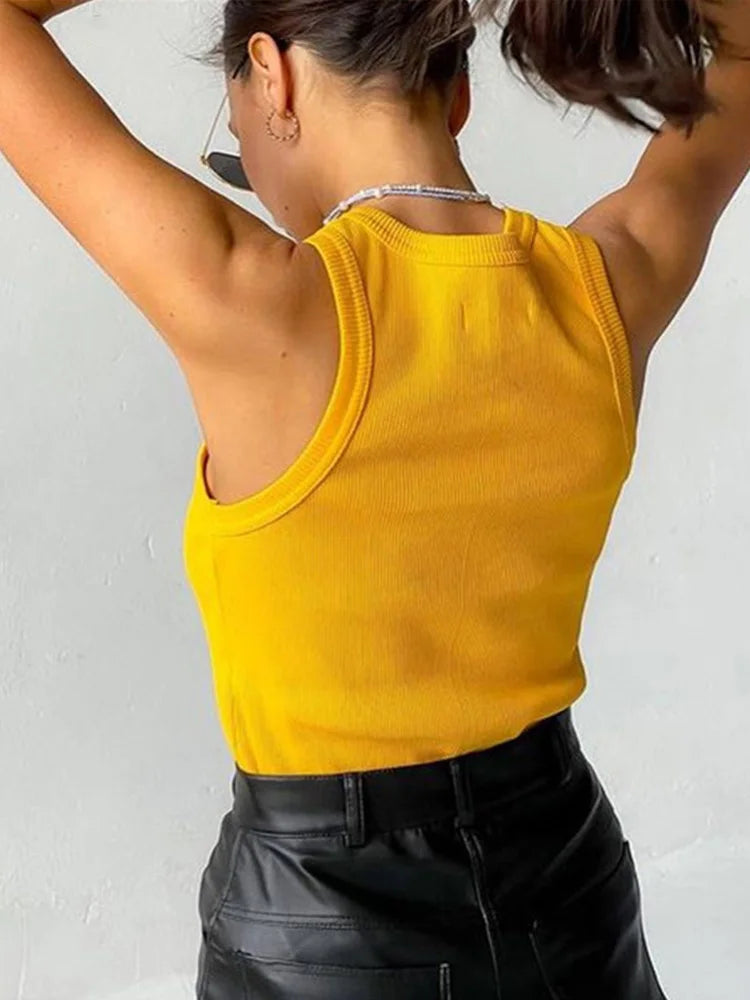 Yellow fitted camisole showcasing high-elasticity fabric construction


