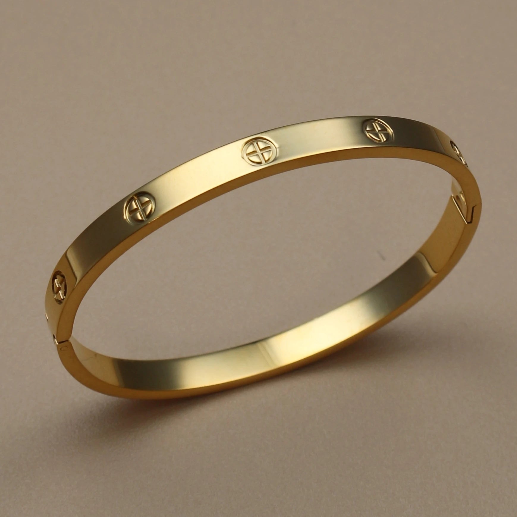 Gold tone rigid bangle bracelet with textured finish – stackable women's fashion jewelry