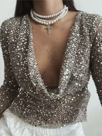 Women's shiny hollow-out sequin top in silver- front view
