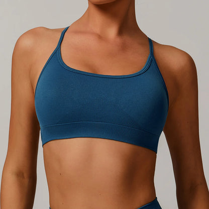 Front view of women's sports bra with thin sling straps – soft activewear for fitness

