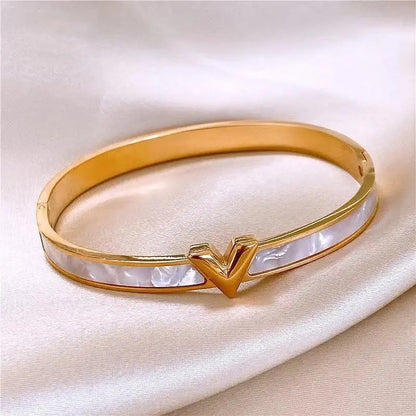 V-shape shell bangle on silk fabric – minimalist gold bracelet gift for women