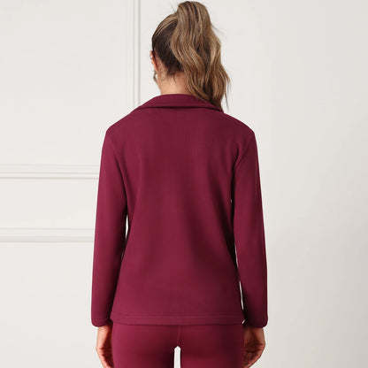 Person wearing a maroon tracksuit 