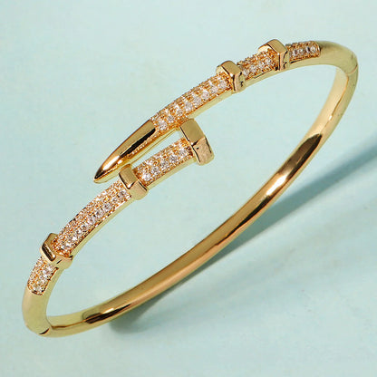 Gold bracelet with diamond accents 