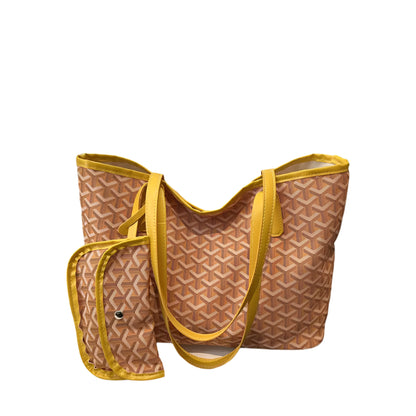 Brown patterned tote bag with yellow handles on a white background