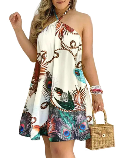 Woman wearing a colorful peacock print dress holding a small bag indoors.