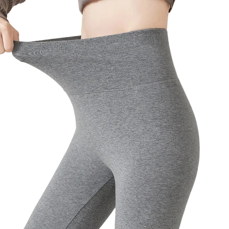 Gray leggings being stretched