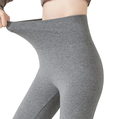 Gray leggings being stretched