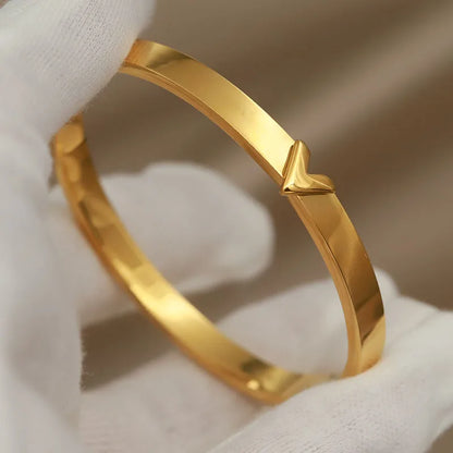 stainless steel gold bangle with polished flat band – elegant slip-on bracelet for women
