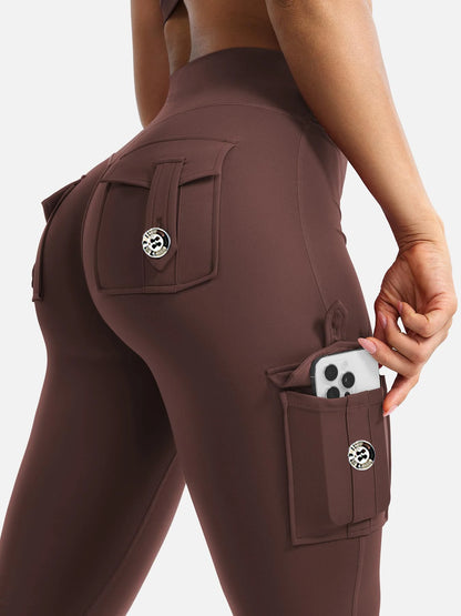 Side phone pocket on high waist cargo leggings holding smartphone
